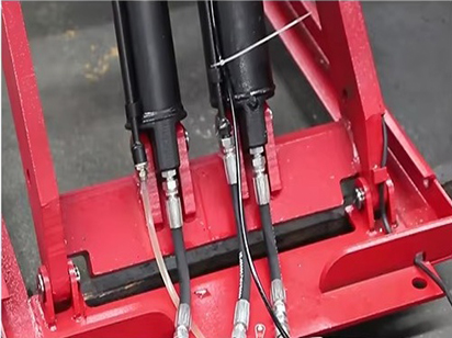 Auxiliary cylinder oil return system.